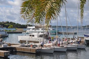 British Virgin Islands Performance Racing Clinic participants getting ready to go out on the race course on fleet of Colgate 26 sailboats