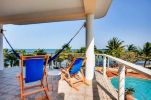 Laru-Beya-Resort-suite-balcony-overlooking-pool-ocean_700x465