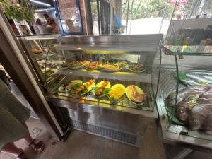 fresh food in display cases at restaurant