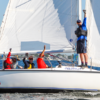 Offshore Sailing School Instructor and Students Sailing a Boat